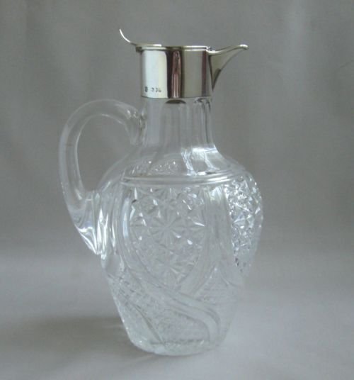 antique silver mounted claret jug