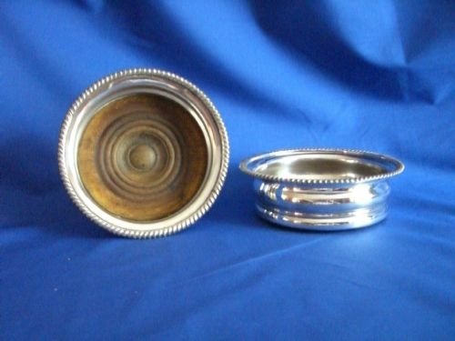 pair antique silverplated wine coasters