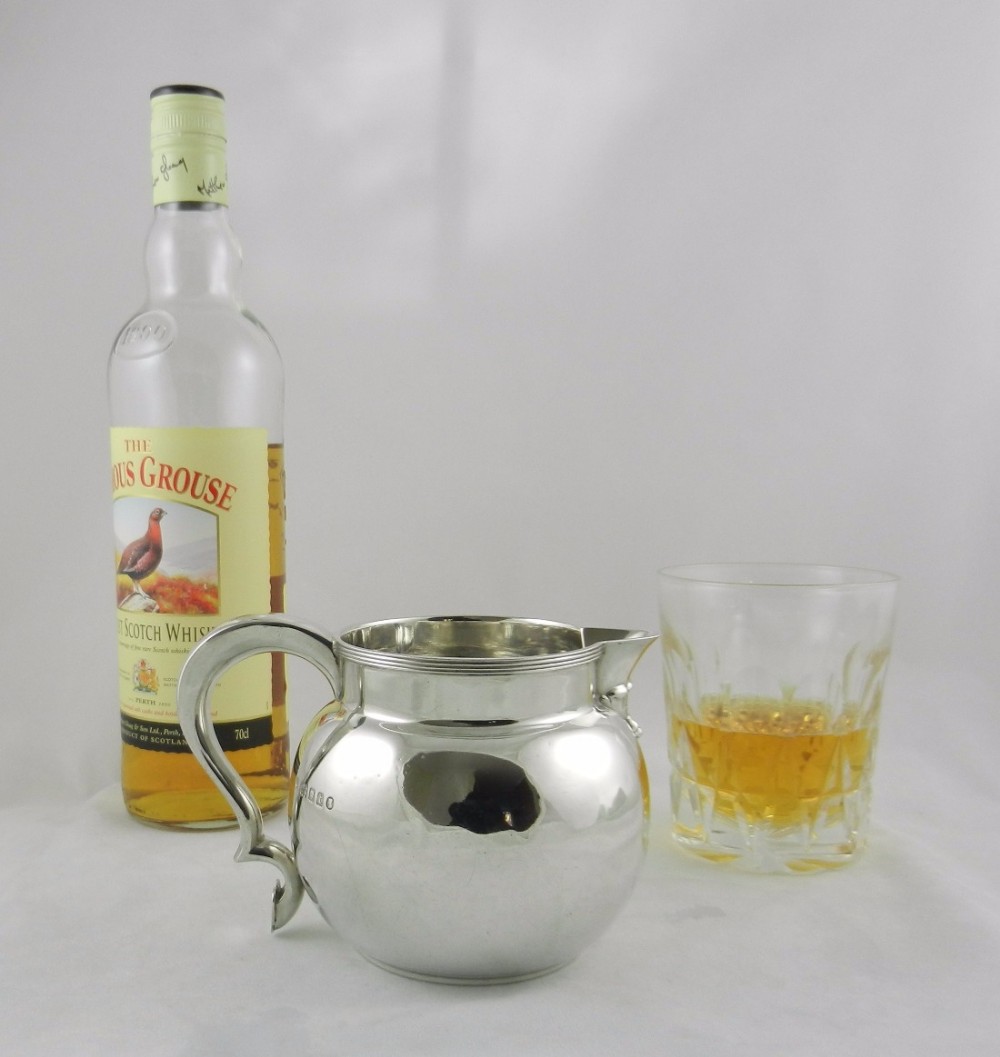 silver whisky water jug