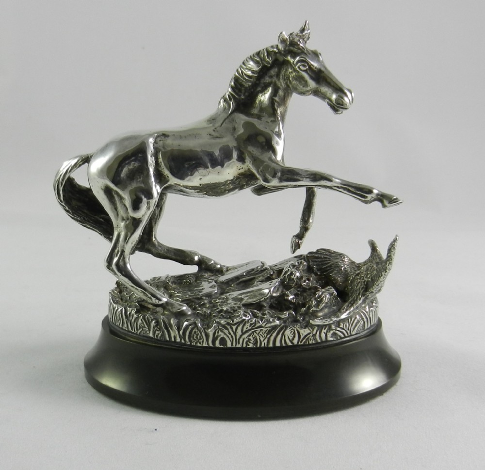 silver horse sculpture