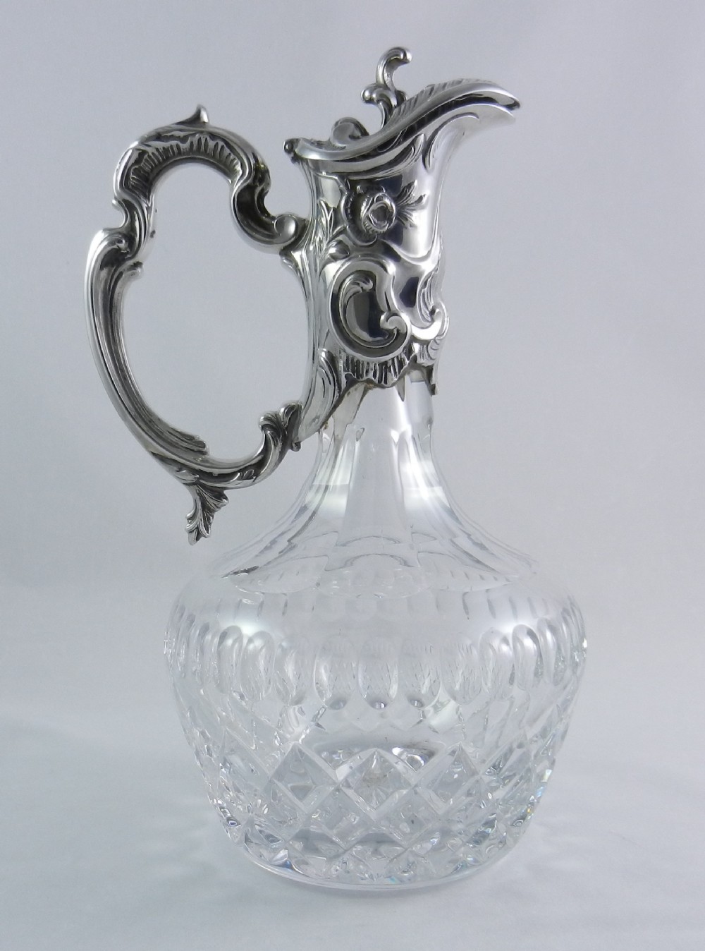 silver cutglass claret jug
