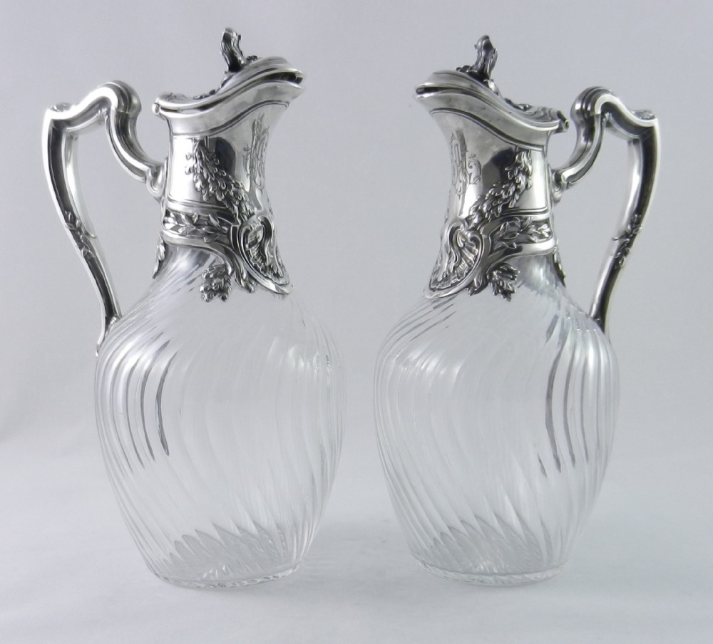 pair antique silvermounted claret jugs
