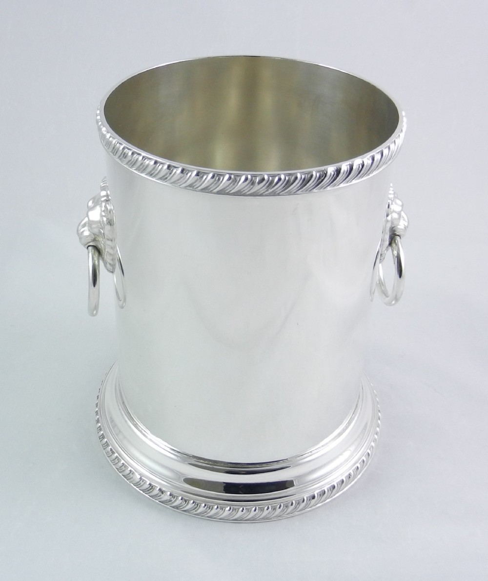 antique silverplated bottle stand