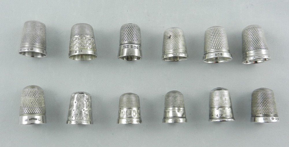 collection of silver thimbles
