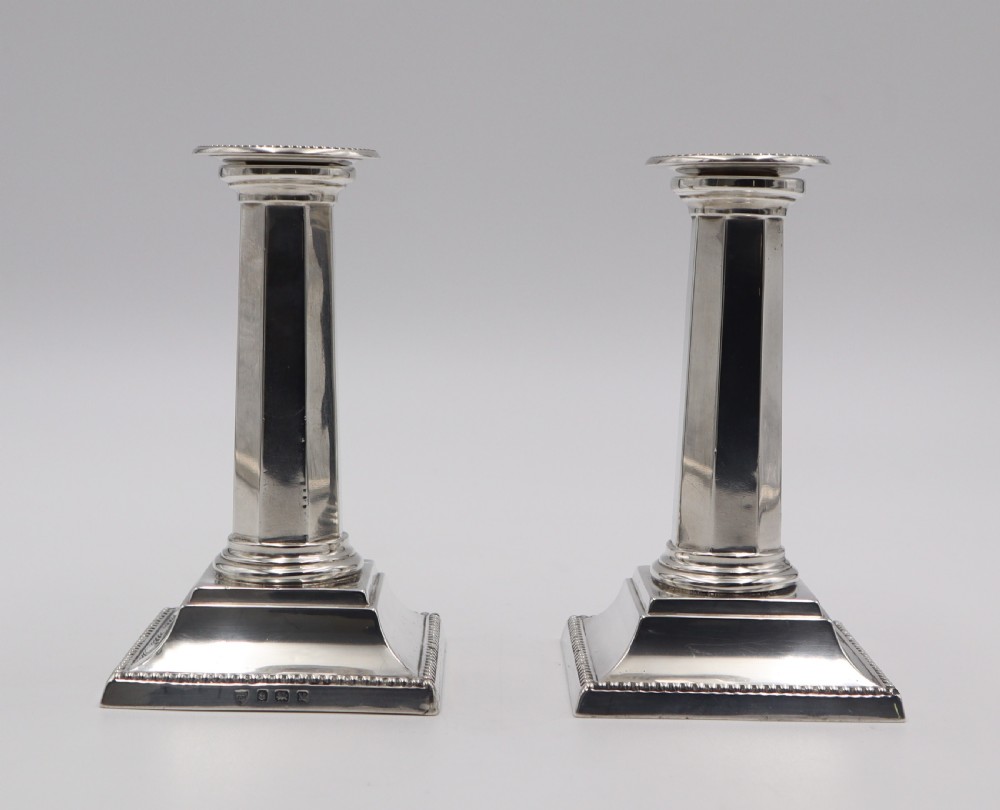 pair silver piano candlesticks