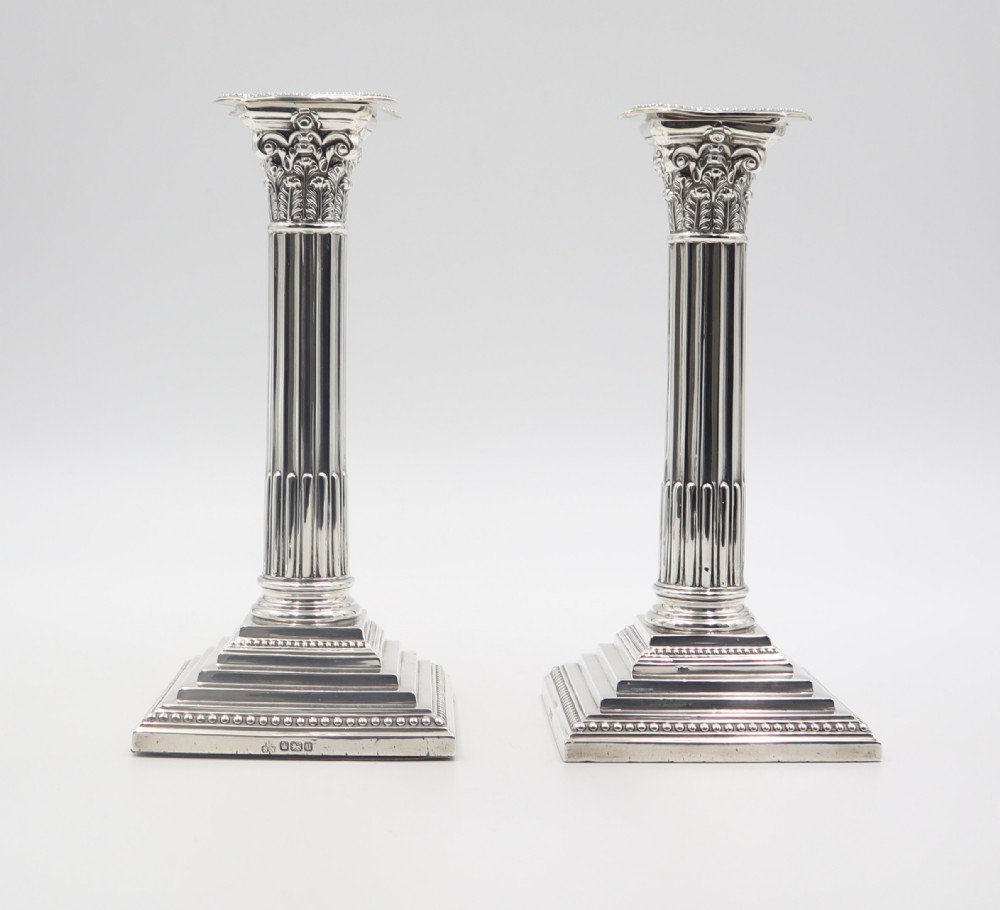 pair antique silver candlesticks