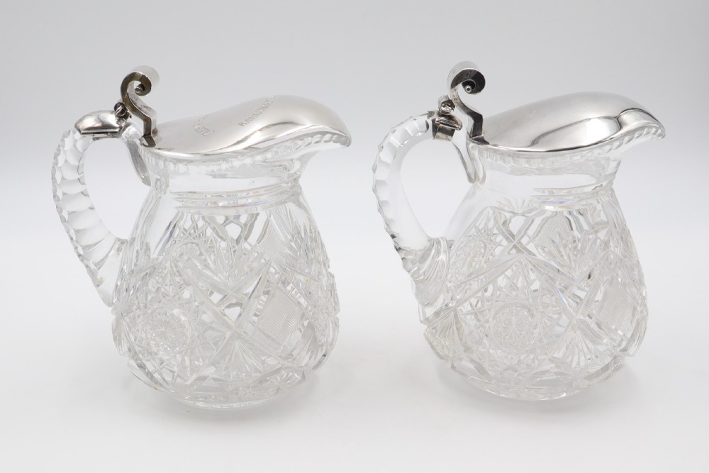 antique silver mounted crystal jugs
